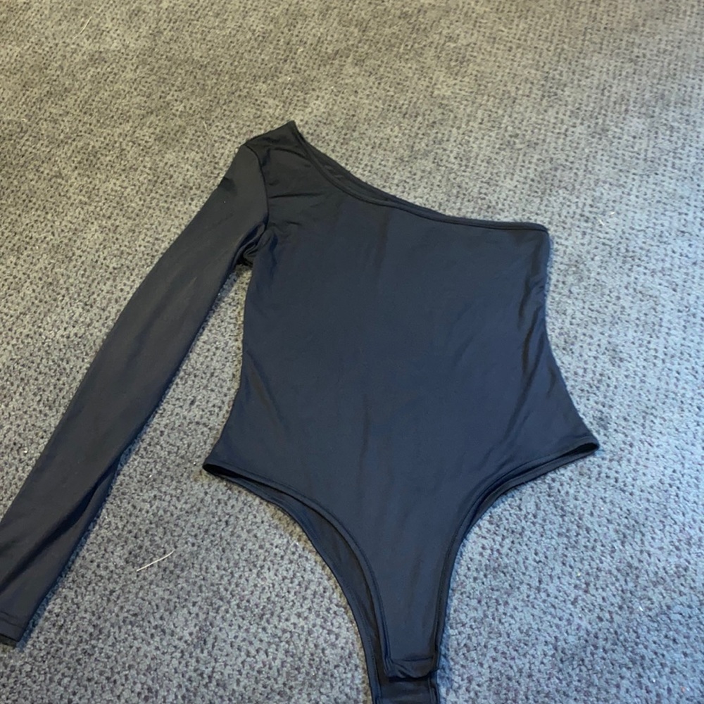Black one arm body suit, very soft material